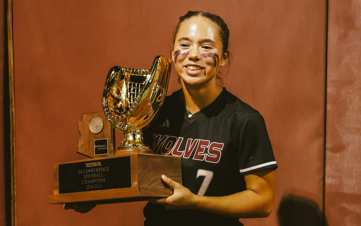 Adrieana Godinez holding trophy